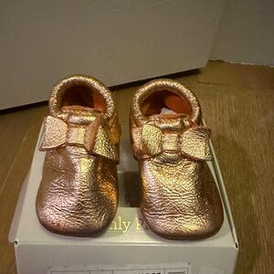 Freshly picked rose gold crib shoes